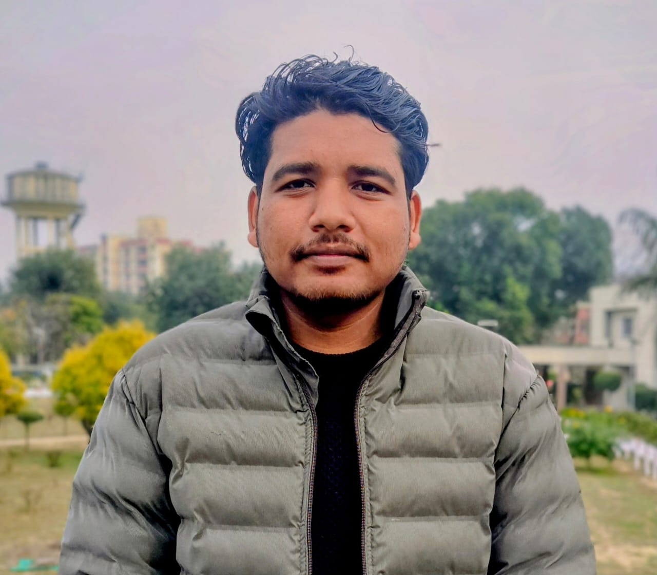 Sh. Tikesh Singh Dhruw